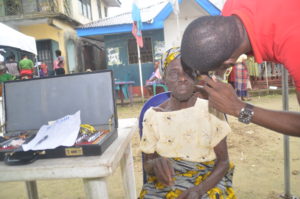 Ophthalmologist examining a patient's eyes
